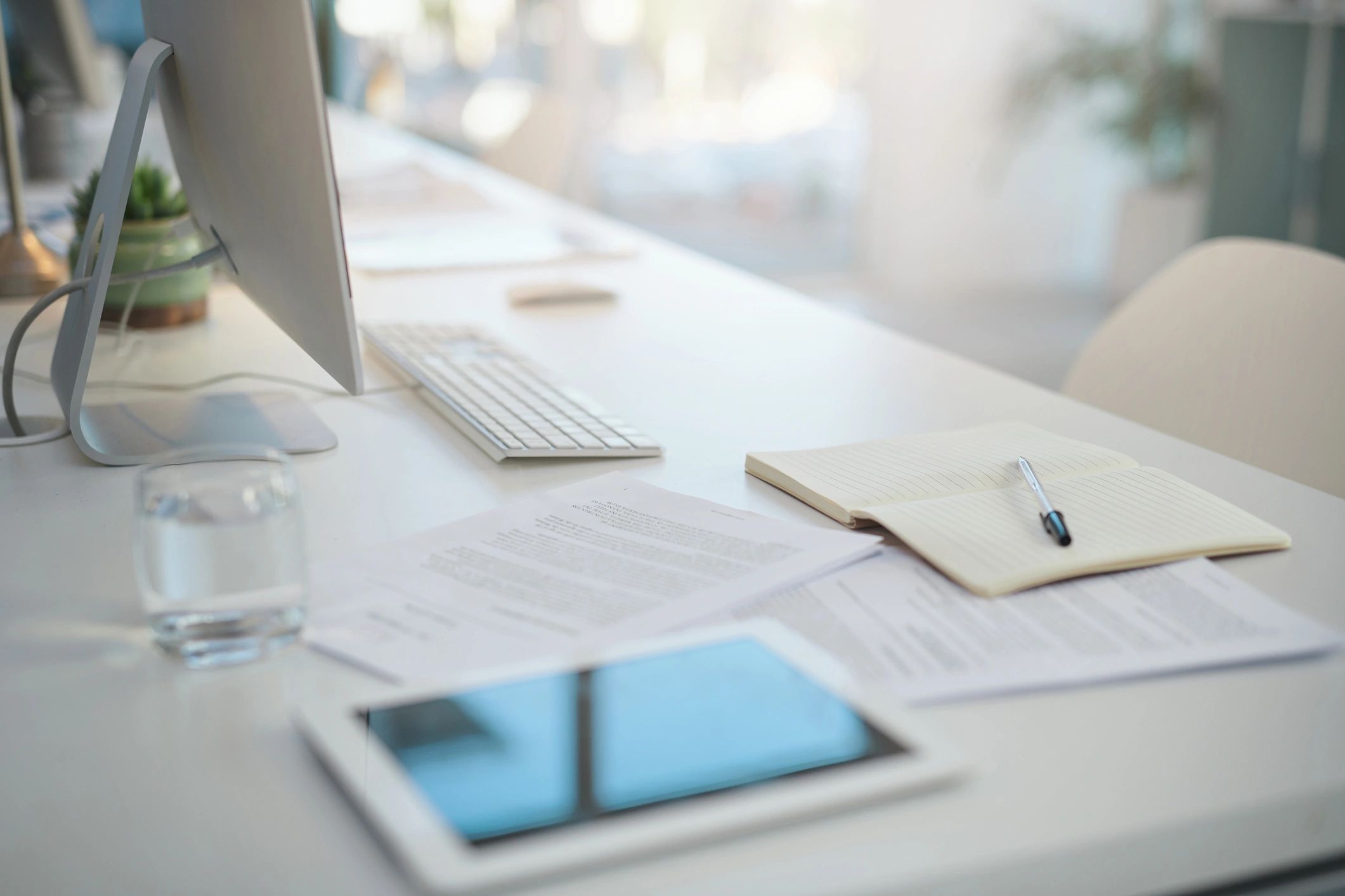 Calm, minimalist workspace representing an organized evaluation timeline
